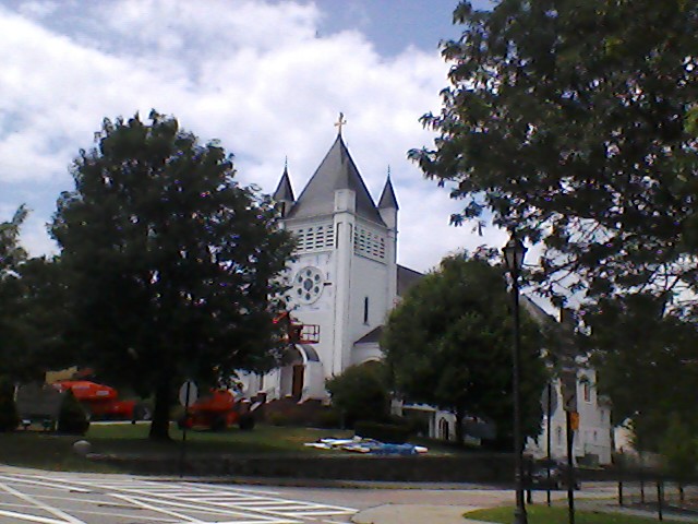 Old church Wellesley, MA with bird on steeple view 2